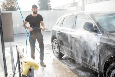 man-washing-car-with-water-gun-2025-03-18-04-59-30-utc-1-scaled-rfk2isdz9vsg6e6oiimz7rdw6gz02zpck9nqfb6acs